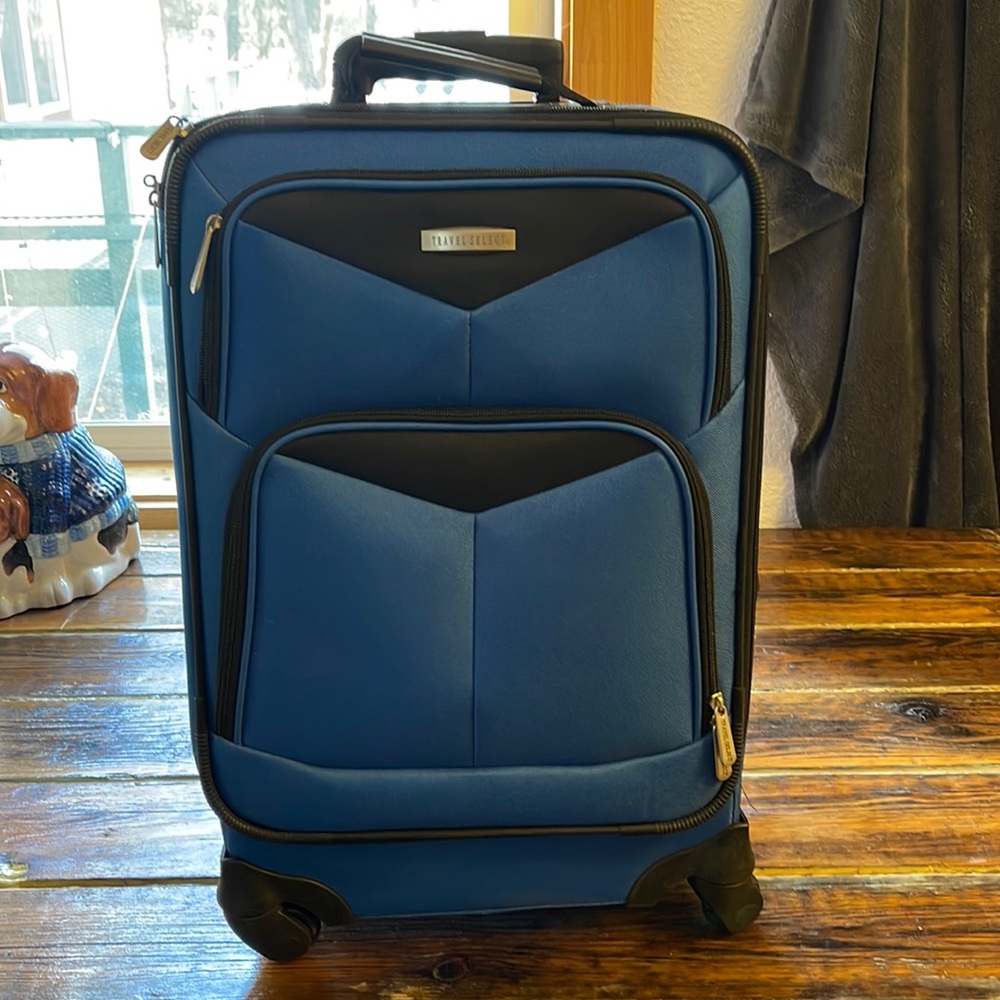 Brand new Travel select spinner luggage set.  Never used.